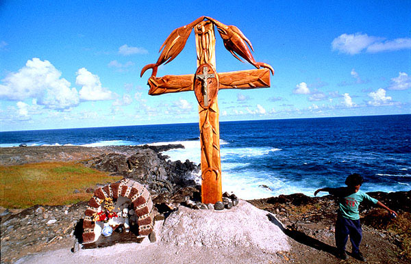 Today, most of the residents on Easter Island are Catholic, and crosses with fish designs have been placed on the beach.