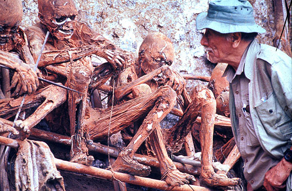 Corpse preserved with red soil in burial caves on cliffs near Oiwa Village, Papua New Guinea.